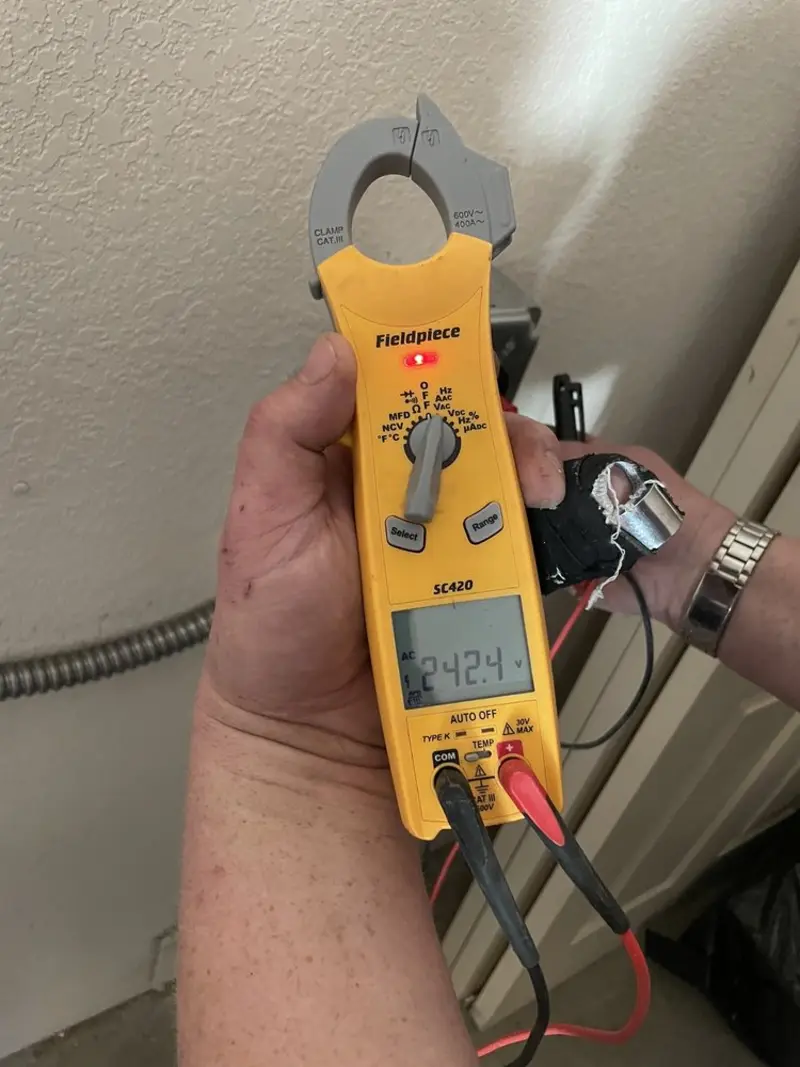 Voltage testing with clamp meter during Recessed Lighting Installation in Cusseta-Chattahoochee County